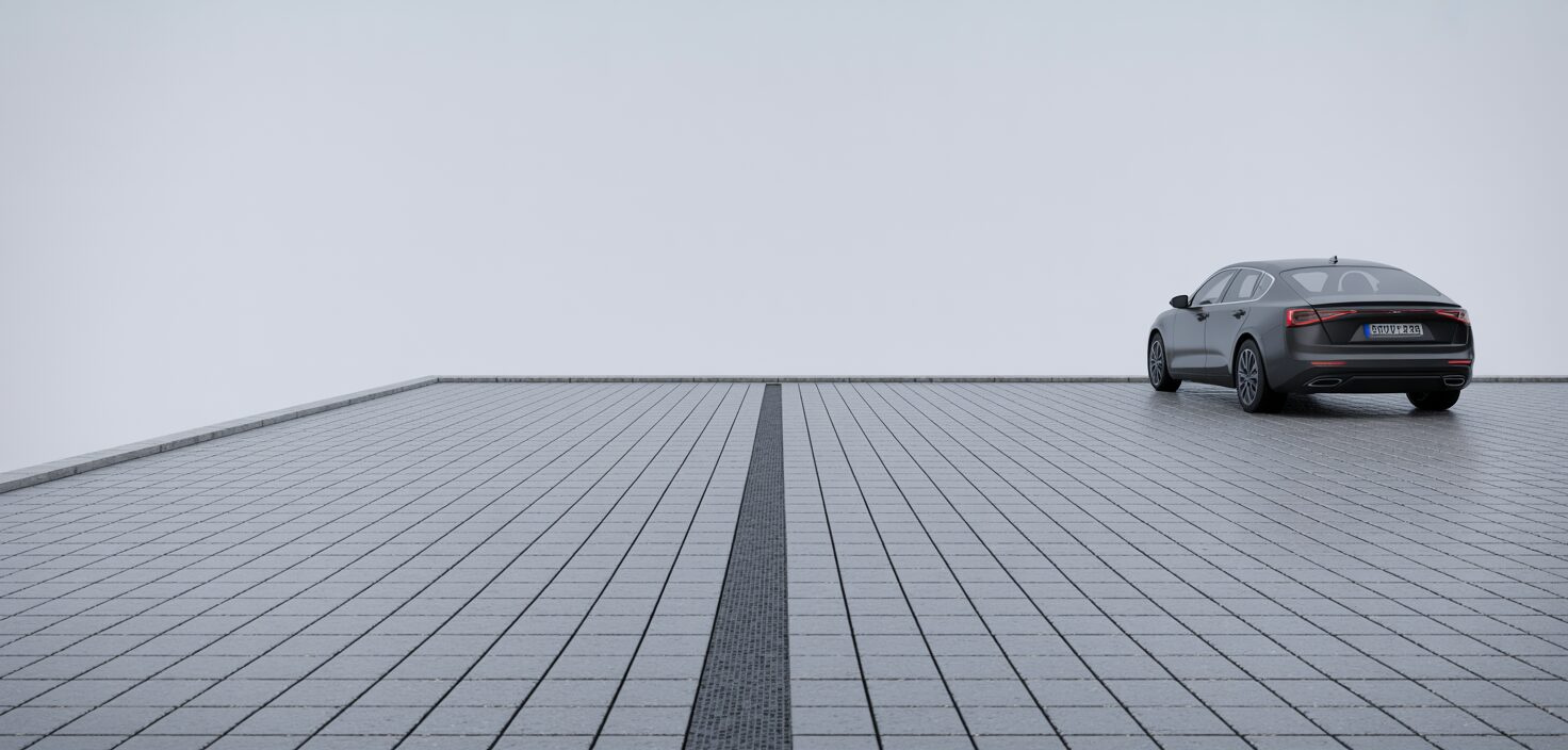 En fotorealistisk bild av en modern uppfart med granitstenar och en enkel, elegant design.